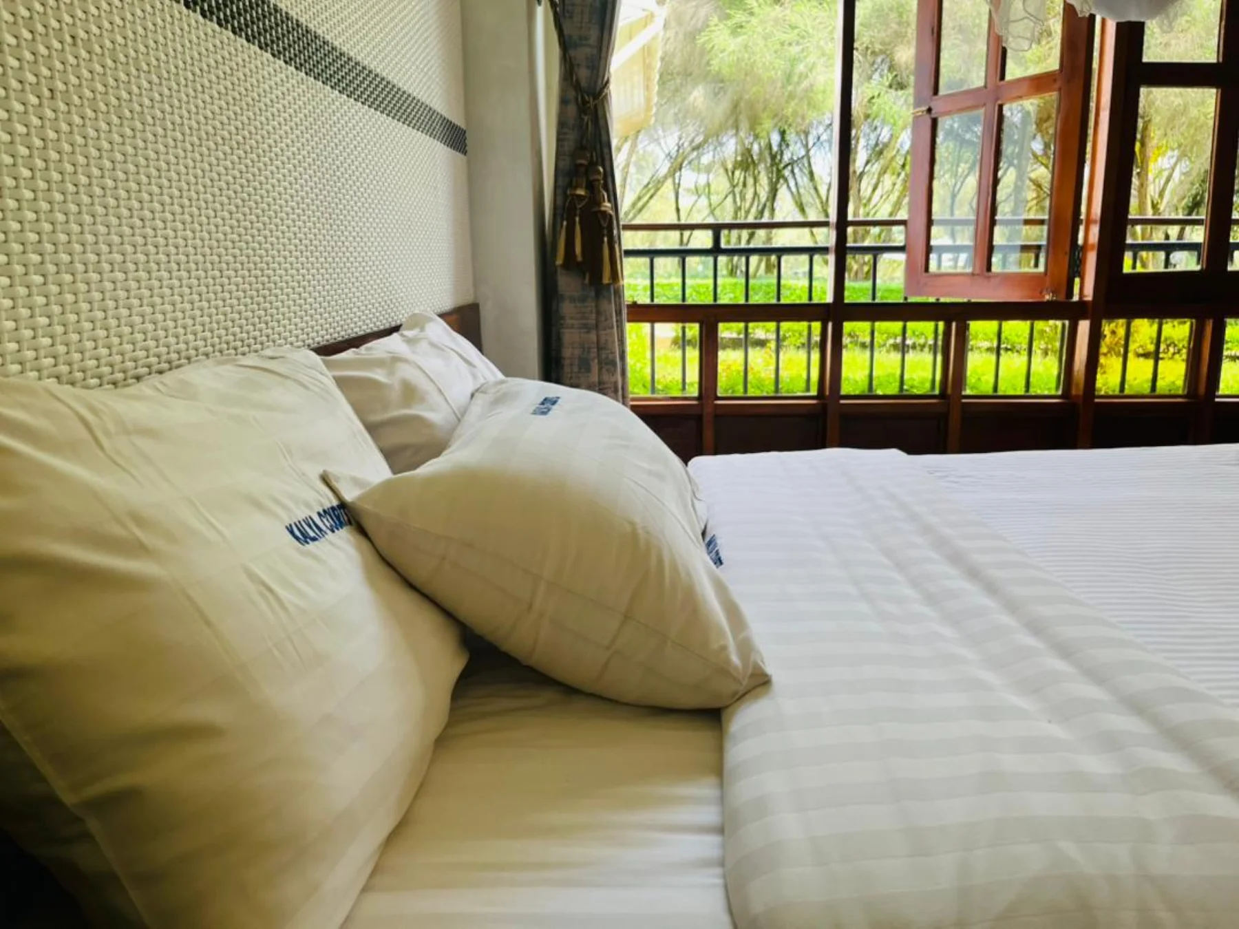 Kalya Courts guest room with balcony view